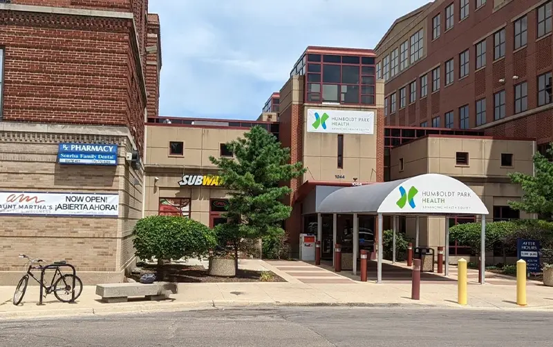 Entrance of Humboldt Park Health in urban setting