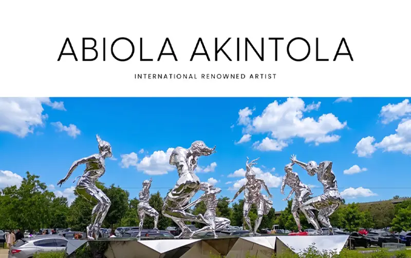 Abiola Akintola sculpture exhibit showcasing dynamic figures under a vibrant blue sky